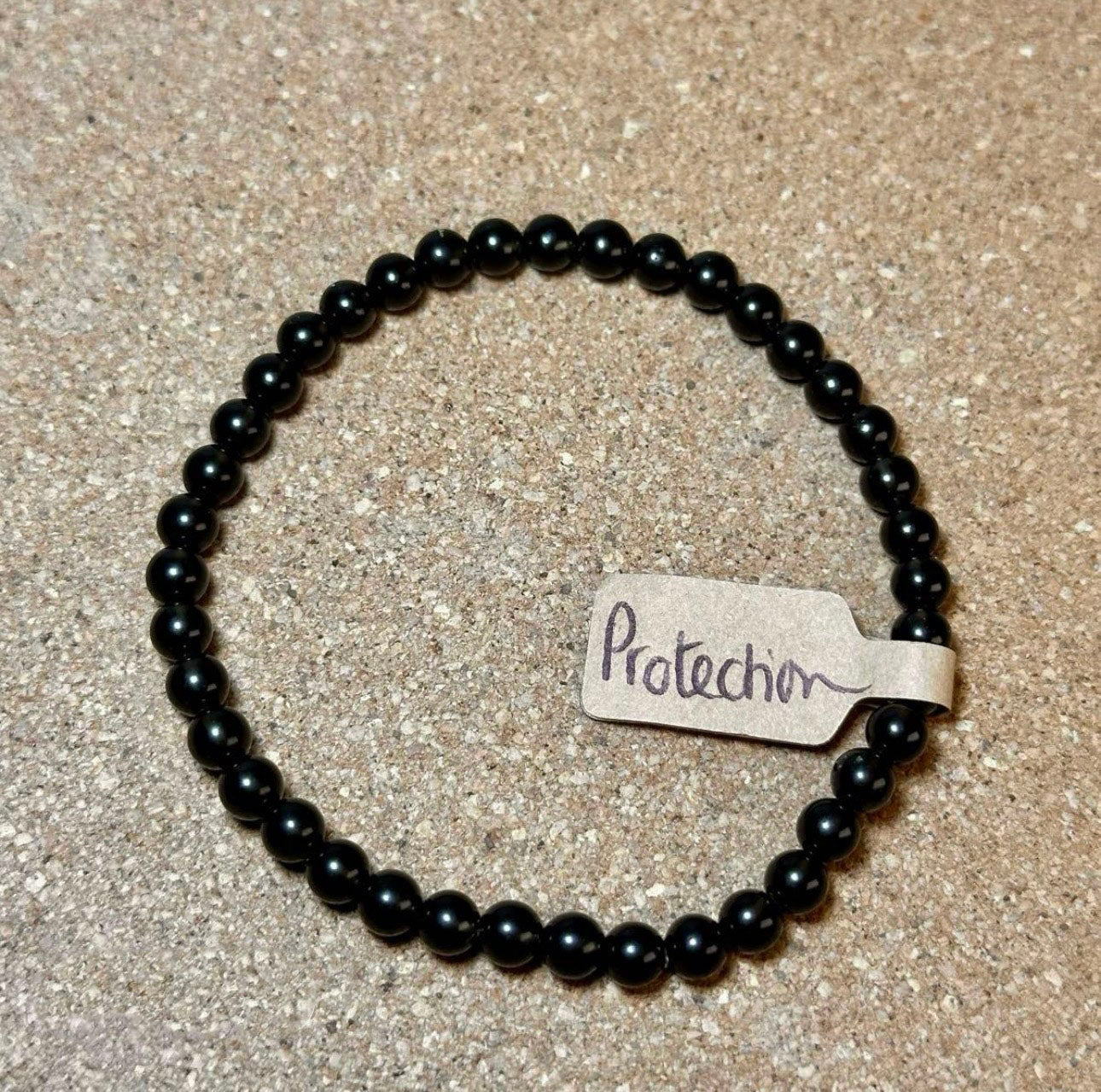 4mm crystal bead bracelet made of obsidian representing protection