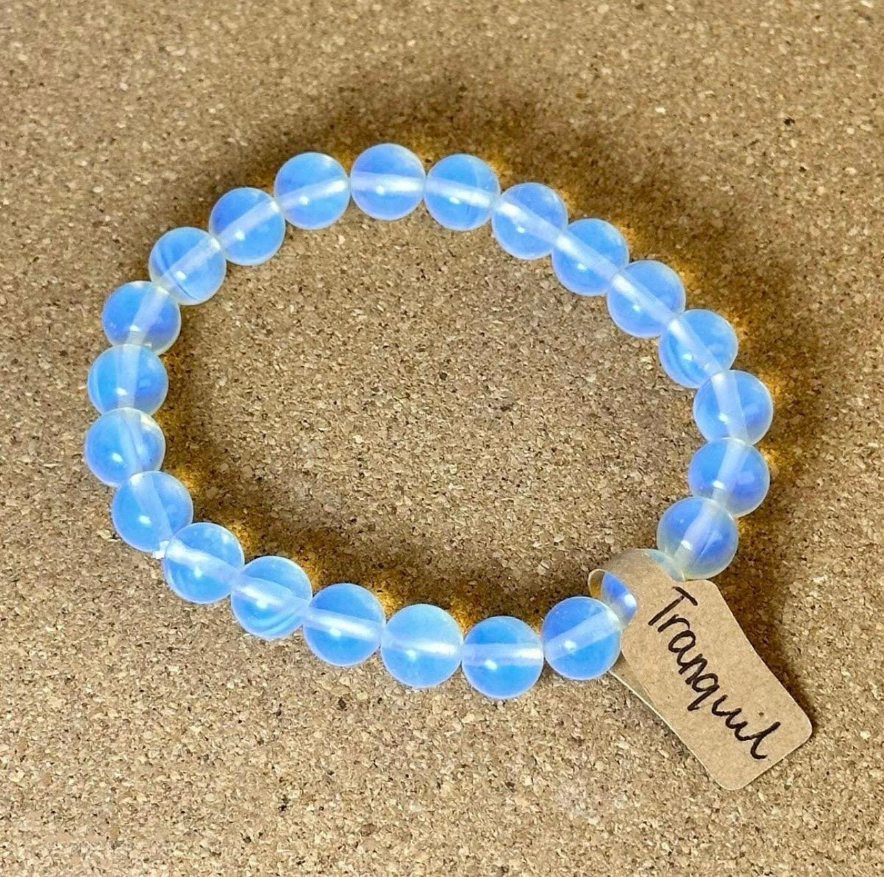 8mm crystal bead bracelet made of opalite representing tranquility