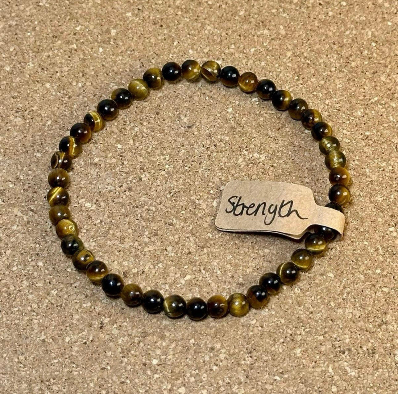 4mm crystal bead bracelet made of tigers eye representing strength